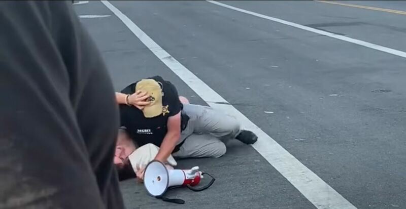 WATCH: Secret Service Smackdown: Woman Tackled in Street After Protesting Biden’s Motorcade