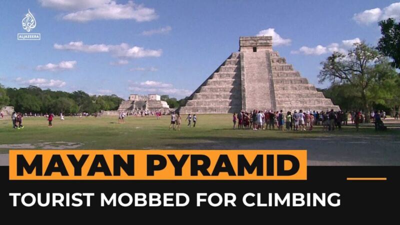 Clueless Tourist Gets Mobbed After Climbing Ancient Mayan Temple (VIDEO)